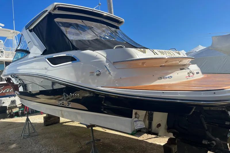  Yacht Photos Pics 2015 Sea Ray 350 SLX boat on display, featuring sleek design and modern amenities.