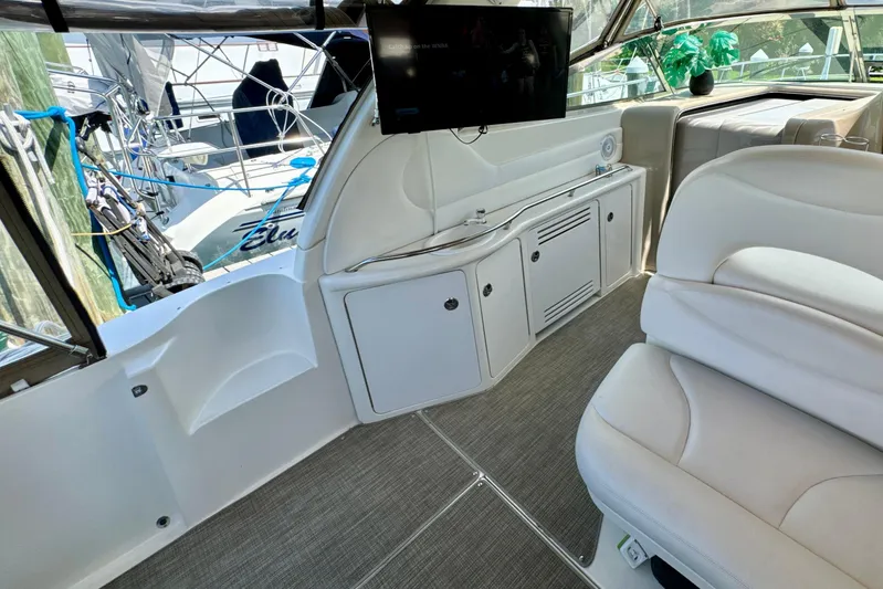Seaswing Yacht Photos Pics Interior of a 2002 Sea Ray 380 Sundancer yacht with seating and entertainment system.