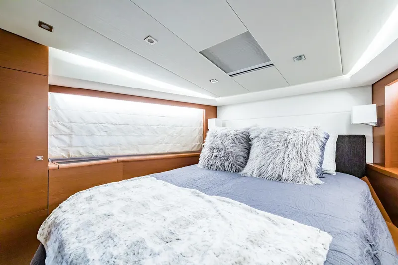  Yacht Photos Pics Luxurious bedroom interior of 2013 Prestige 500 Fly yacht with plush bedding.