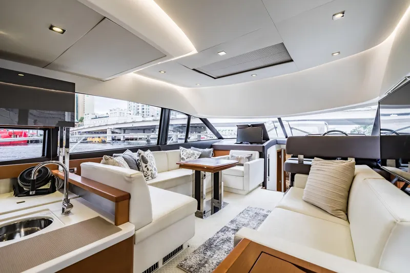  Yacht Photos Pics Luxurious interior of 2013 Prestige 500 Fly yacht with modern seating and elegant design.