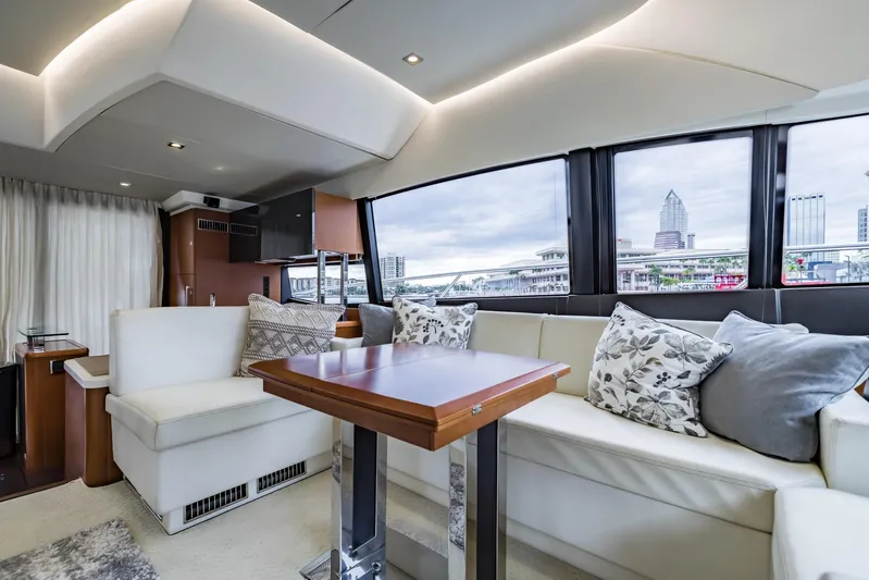  Yacht Photos Pics Luxurious interior of 2013 Prestige 500 Fly yacht with elegant seating and cityscape view.