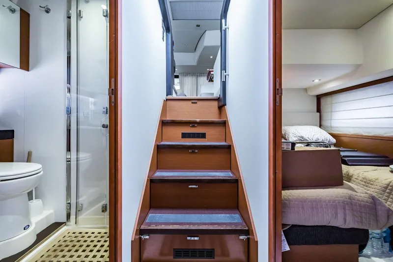  Yacht Photos Pics Interior of 2013 Prestige 500 Fly yacht with stairs, bathroom, and bedroom.