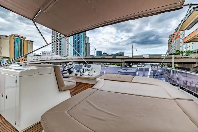  Yacht Photos Pics Prestige 500 Fly 2013 yacht with spacious deck, cityscape view, and modern controls.