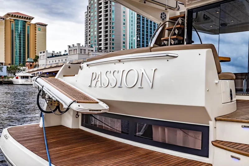  Yacht Photos Pics Prestige 500 Fly 2013 yacht "Passion" docked near urban buildings.
