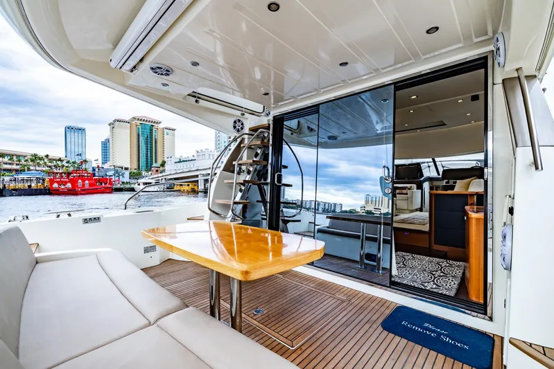  Yacht Photos Pics 2013 Prestige 500 Fly yacht with elegant interior and cityscape view.