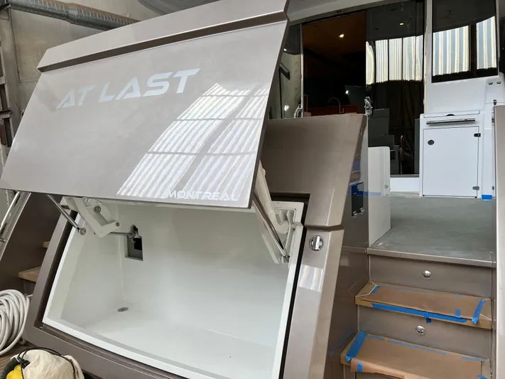 Sea At Last Yacht Photos Pics 2025 Altima Express Coupe interior with open hatch and modern design elements.