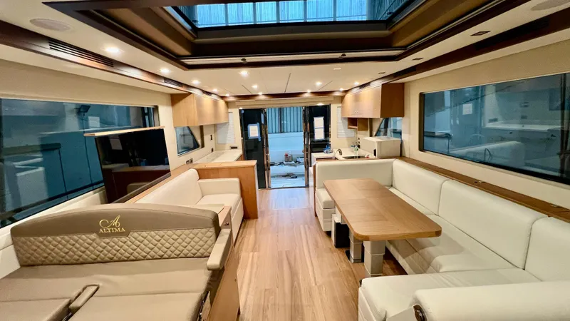 Sea At Last Yacht Photos Pics Luxurious interior of 2025 Altima Express Coupe with elegant seating and modern design.