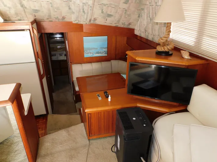Miss Approach Yacht Photos Pics Interior of 1991 Viking 45' Convertible yacht with cozy seating and modern amenities.