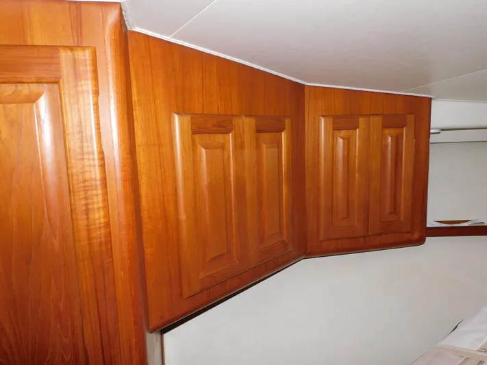 Miss Approach Yacht Photos Pics Wooden cabinetry inside 1991 Viking 45' Convertible yacht interior.