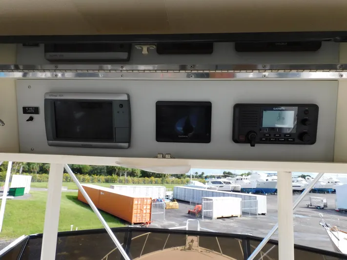 Miss Approach Yacht Photos Pics 1991 Viking 45' Convertible boat dashboard with navigation and communication equipment.
