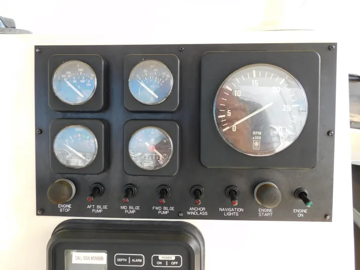 Miss Approach Yacht Photos Pics Control panel of a 1991 Viking 45' Convertible boat with gauges and switches.