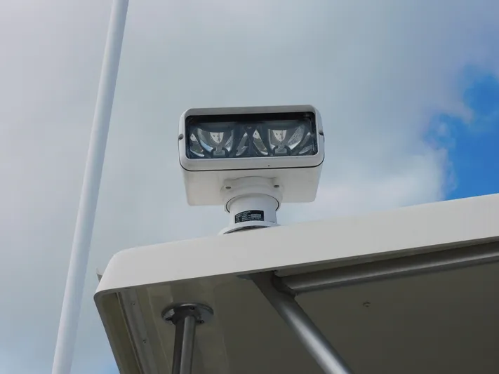 Miss Approach Yacht Photos Pics Spotlight on 1991 Viking 45' Convertible boat against cloudy sky.