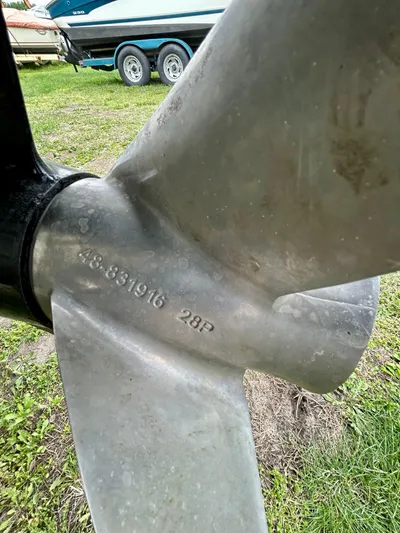  Yacht Photos Pics Close-up of a boat propeller with engraved numbers, Formula 353 FASTech 2008 in background.