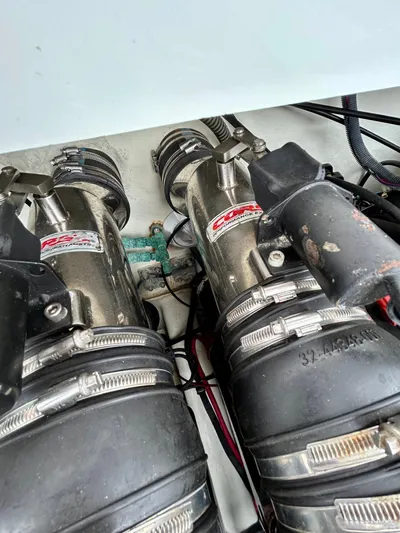  Yacht Photos Pics Engine components of a 2008 Formula 353 FASTech boat, featuring stainless steel parts and hoses.