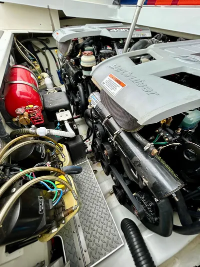  Yacht Photos Pics 2008 Formula 353 FASTech engine compartment with dual MerCruiser engines and red fire extinguisher.