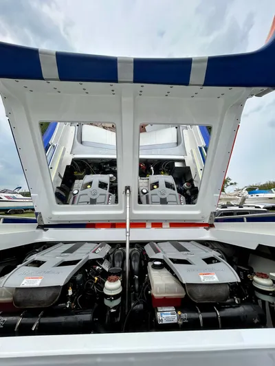  Yacht Photos Pics 2008 Formula 353 FASTech boat engine compartment with open hatch, showcasing dual engines.