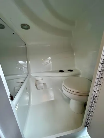  Yacht Photos Pics 2008 Formula 353 FASTech boat bathroom with white interior and compact design.