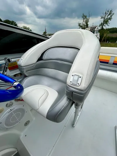  Yacht Photos Pics 2008 Formula 353 FASTech boat seat with gray and white upholstery under cloudy sky.