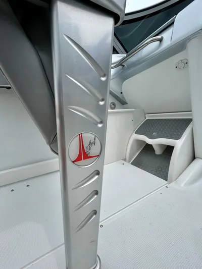  Yacht Photos Pics 2008 Formula 353 FASTech boat interior with sleek metal detailing and textured flooring.