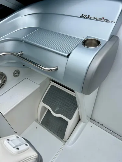  Yacht Photos Pics 2008 Formula 353 FASTech boat interior with sleek design and cup holder.