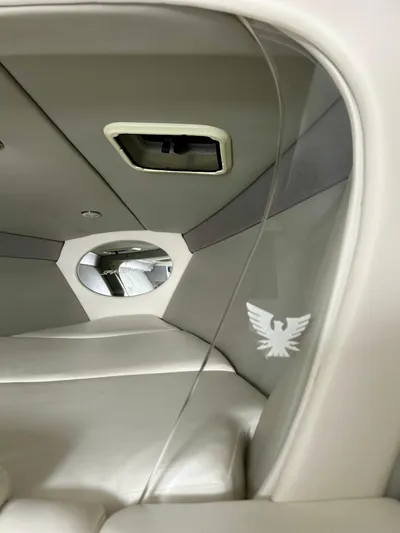  Yacht Photos Pics Interior of a 2008 Formula 353 FASTech boat cabin with sleek white seating.