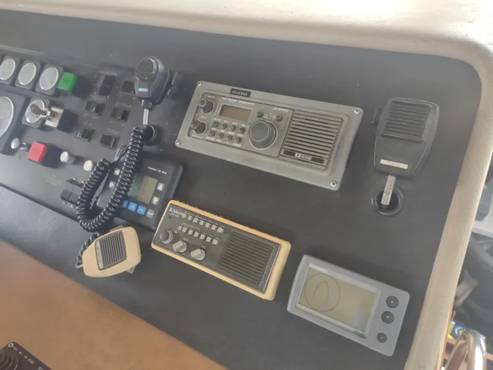  Yacht Photos Pics Control panel of a 1988 Hatteras 60 Motor Yacht with communication equipment.