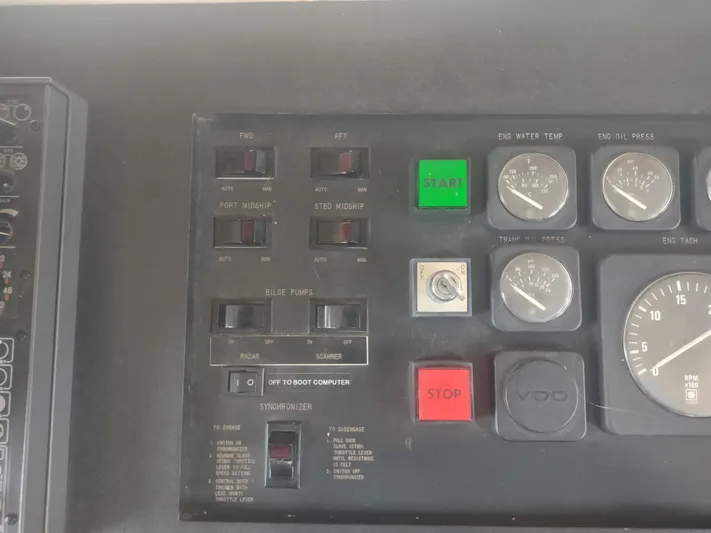  Yacht Photos Pics Control panel of a 1988 Hatteras 60 Motor Yacht with gauges and switches.