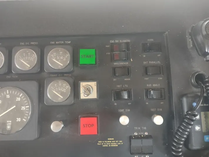  Yacht Photos Pics Control panel of a 1988 Hatteras 60 Motor Yacht with gauges and switches.