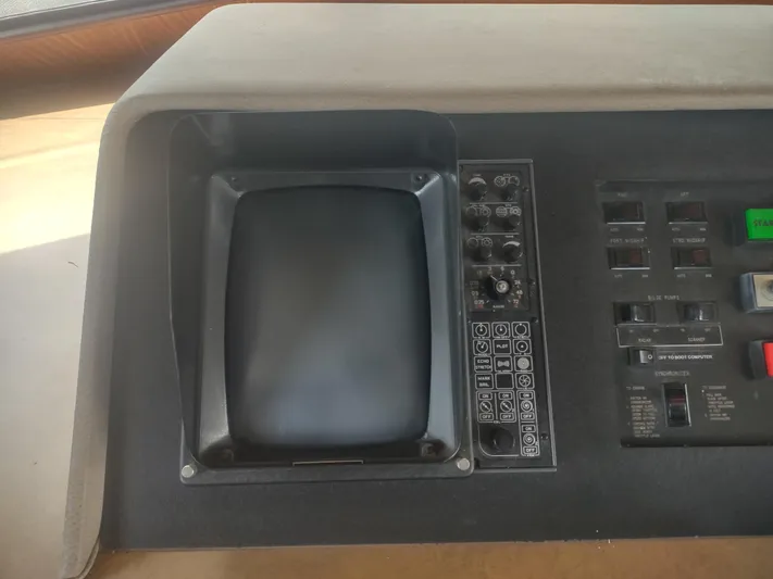  Yacht Photos Pics Control panel of a 1988 Hatteras 60 Motor Yacht with vintage electronics.