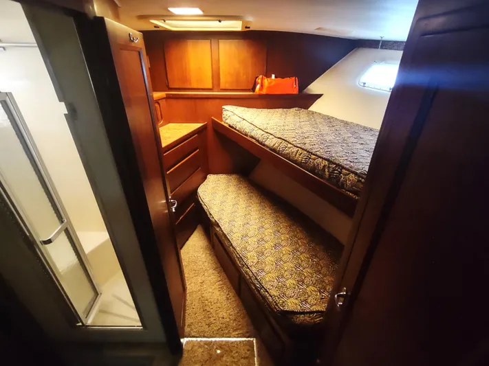  Yacht Photos Pics Cozy cabin with bunk beds in 1988 Hatteras 60 Motor Yacht.
