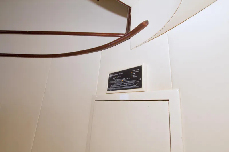 Bliss Yacht Photos Pics Interior of 2005 Neptunus 62 Flybridge yacht with diagram on wall.