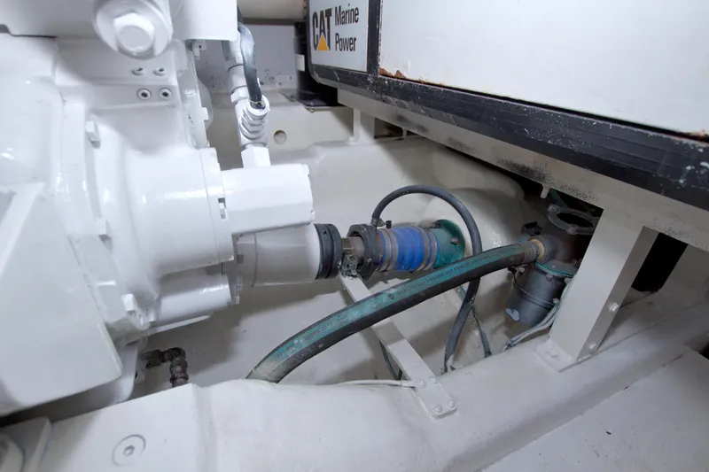 Bliss Yacht Photos Pics Engine compartment of 2005 Neptunus 62 Flybridge with CAT Marine Power components.