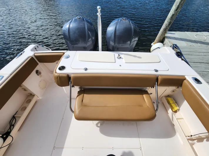  Yacht Photos Pics 2008 Grady-White 306 Bimini CC boat with twin outboard motors docked.