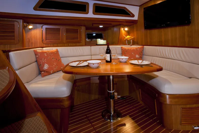 Providence Yacht Photos Pics Luxurious interior of 2013 Passport 470 Center Cockpit yacht with elegant dining area.