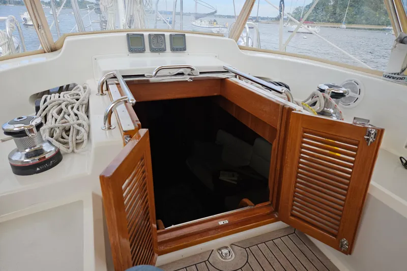 Providence Yacht Photos Pics Cockpit of 2013 Passport 470 Center Cockpit sailboat with open wooden hatch.