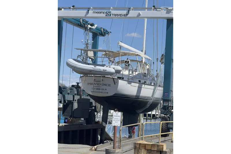 Providence Yacht Photos Pics Sailboat "Providence" on lift, Passport 470 Center Cockpit, 2013 model, at marina.