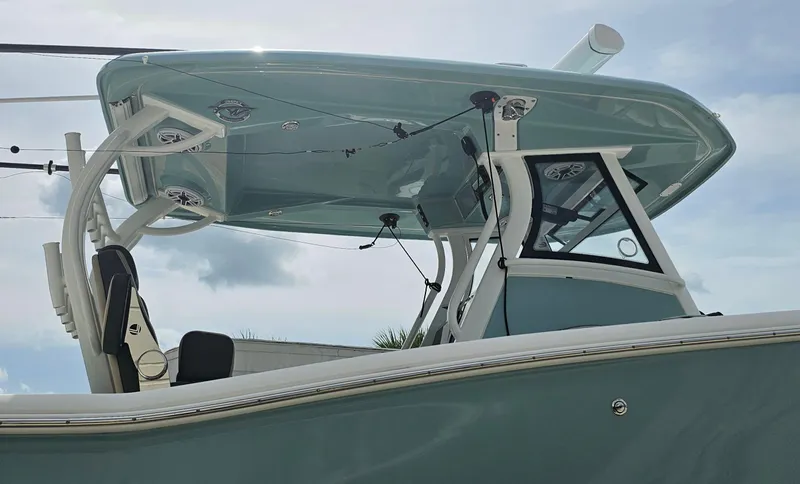  Yacht Photos Pics 2022 Tidewater 320 CC Adventure boat with sleek design and modern features.