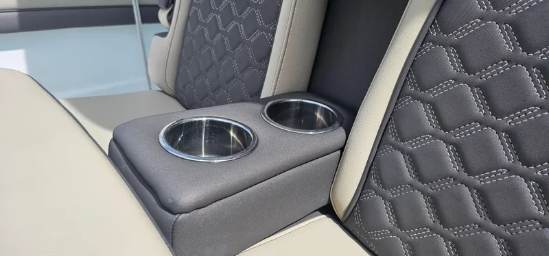  Yacht Photos Pics 2022 Tidewater 320 CC Adventure boat seat with cup holders and quilted upholstery.