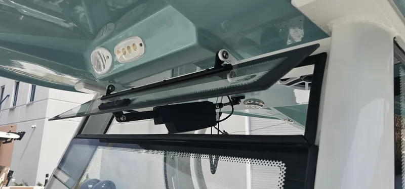  Yacht Photos Pics Tidewater 320 CC Adventure 2022 boat windshield and roof detail.