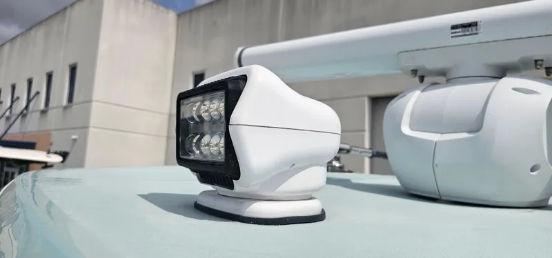  Yacht Photos Pics Close-up of a 2022 Tidewater 320 CC Adventure boat's radar and spotlight.