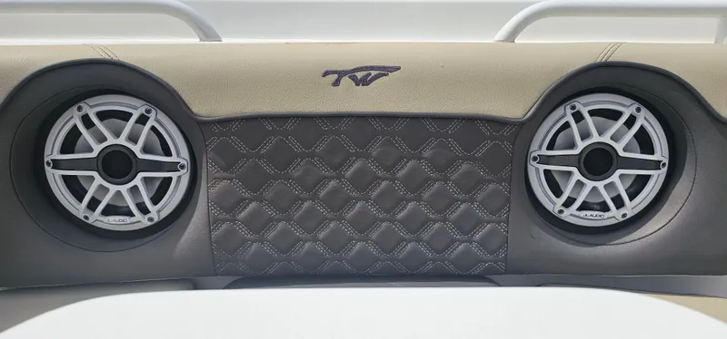  Yacht Photos Pics Tidewater 320 CC Adventure 2022 boat speakers with quilted upholstery detail.