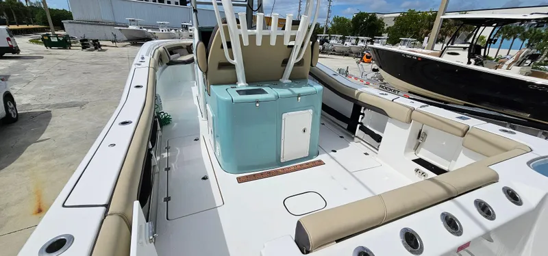  Yacht Photos Pics 2022 Tidewater 320 CC Adventure boat with spacious deck and seating.