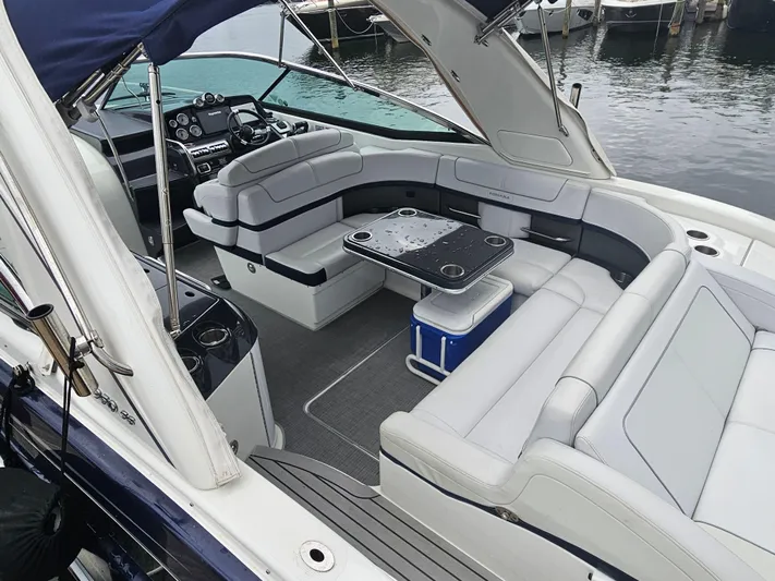  Yacht Photos Pics 2018 Formula 350 Sun Sport boat with spacious seating and modern interior at a marina.