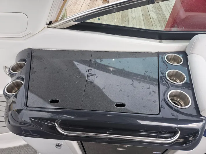  Yacht Photos Pics 2018 Formula 350 Sun Sport boat interior with wet bar and cup holders.