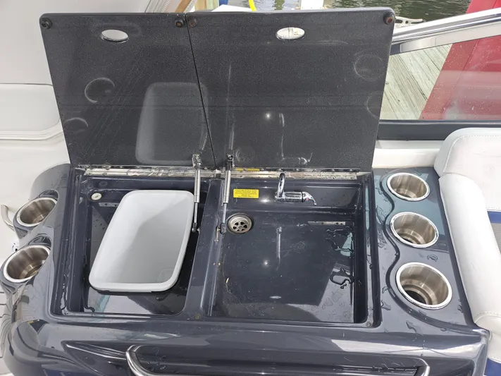  Yacht Photos Pics 2018 Formula 350 Sun Sport boat sink and cup holders on deck.