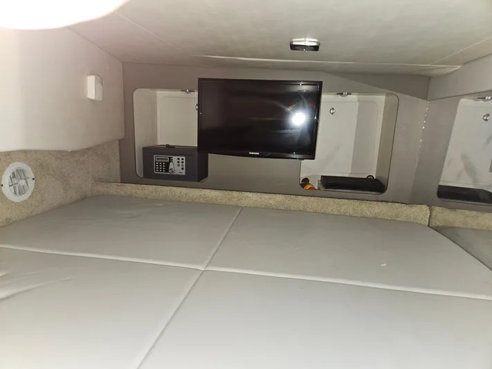  Yacht Photos Pics 2018 Formula 350 Sun Sport cabin interior with TV and safe.