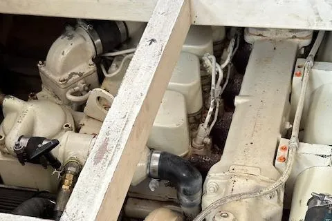 Emily Anne Yacht Photos Pics Engine compartment of a 2001 Island Gypsy Euro Sedan Trawler, showcasing mechanical components.