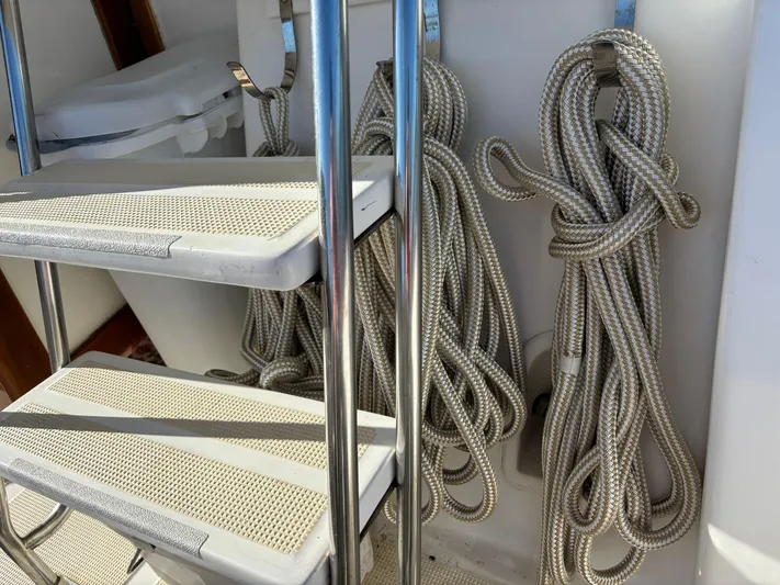 Emily Anne Yacht Photos Pics Staircase and coiled ropes on 2001 Island Gypsy Euro Sedan Trawler.