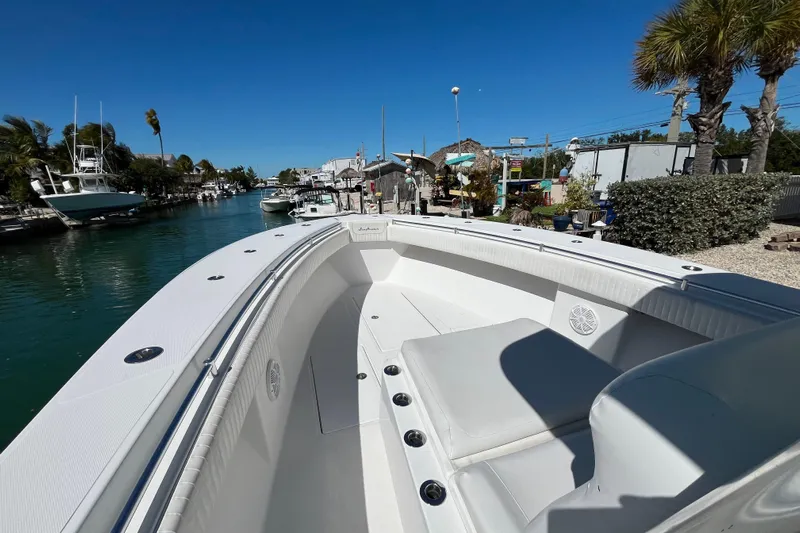  Yacht Photos Pics 2016 SeaHunter 35 Tournament boat docked in a scenic marina under clear blue skies.
