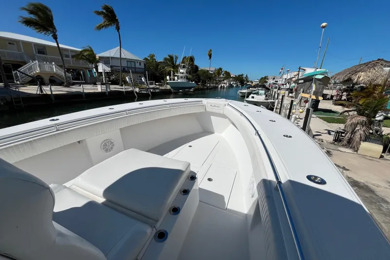  Yacht Photos Pics 2016 SeaHunter 35 Tournament boat docked in a sunny marina with palm trees.